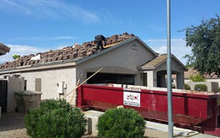 roofer using geometry math for layout of roof