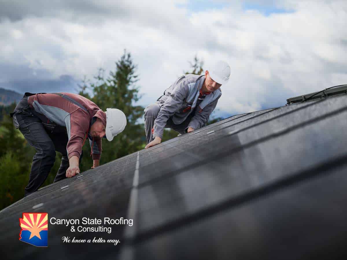 Roof Repair in Phoenix Roofing Contractors Inspecting Roof