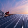 Standing seam metal roof installation for a modern Peoria home